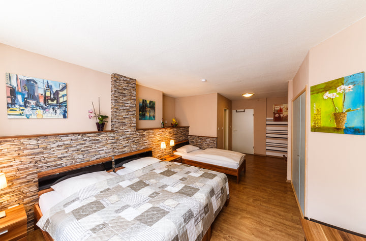 Dreibettzimmer